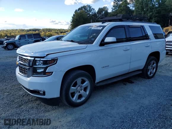2015 Chevrolet Tahoe LT with VIN 1GNSKBKC9FR274007, listed as a Copart auction lot 85695475 with 154,474 mi miles and Salvage title. Bid and sale history available at DreamBid. Image 1.