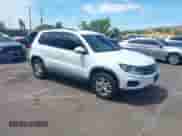 2015 Volkswagen Tiguan SEL with VIN WVGBV7AX6FW587773, listed as a IAAI auction lot 43141504 with 121,093 mi miles and . Bid and sale history available at DreamBid. Image 1.