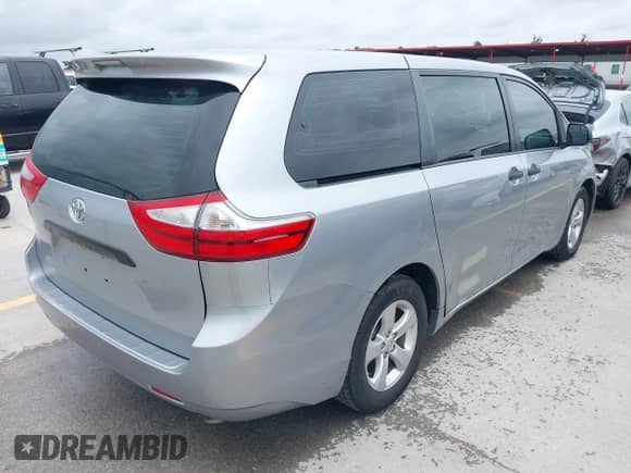 2015 Toyota Sienna L with VIN 5TDZK3DC6FS673338, listed as a IAAI auction lot 42497655 with 158,216 mi miles and . Bid and sale history available at DreamBid. Image 4.