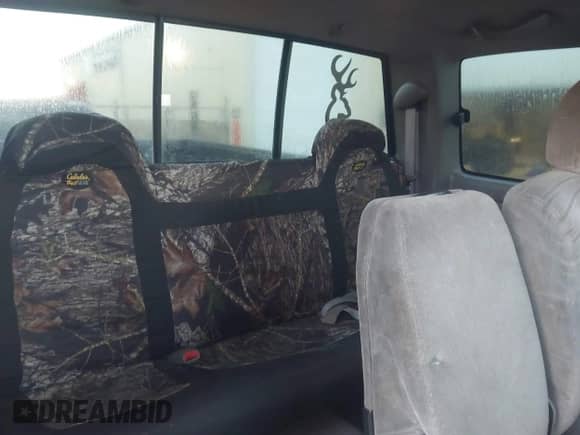 2000 Chevrolet Silverado 1500 z VIN 1GCEK19TXYZ186320, wystawiony jako IAAI lot #43506192 z przebiegiem 347 185 mil mil oraz . Historia ofert i sprzedaży dostępna na DreamBid. Obrazek 8.