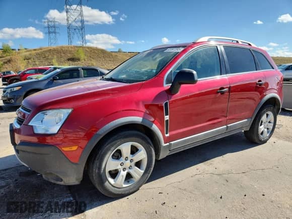 2013 Chevrolet Captiva Sport LS with VIN 3GNAL2EK5DS609561, listed as a Copart auction lot 82097395 with 115,068 mi miles and Clean title. Bid and sale history available at DreamBid. Image 1.