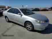 2005 Toyota Camry XLE с VIN 4T1BF30K65U599363, выставлен на аукционе Copart как лот 81202785 с пробегом 116 670 миль миль и Списание • Salvage title. История ставок и продаж доступна на DreamBid. Изображение 4.