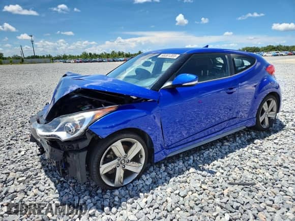 2014 Hyundai Veloster Turbo R-Spec с VIN KMHTC6AEXEU200820, выставлен на аукционе Copart как лот 68381355 с пробегом 77 736 миль миль и Списание • Salvage title. История ставок и продаж доступна на DreamBid. Изображение 1.