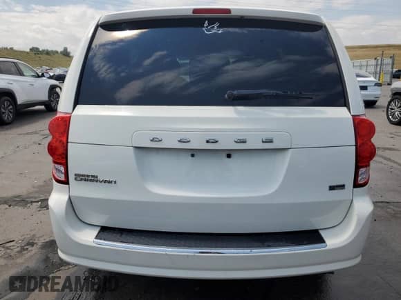 2013 Dodge Grand Caravan SXT with VIN 2C4RDGCG9DR523381, listed as a Copart auction lot 65055335 with 156,250 mi miles and Salvage title. Bid and sale history available at DreamBid. Image 6.