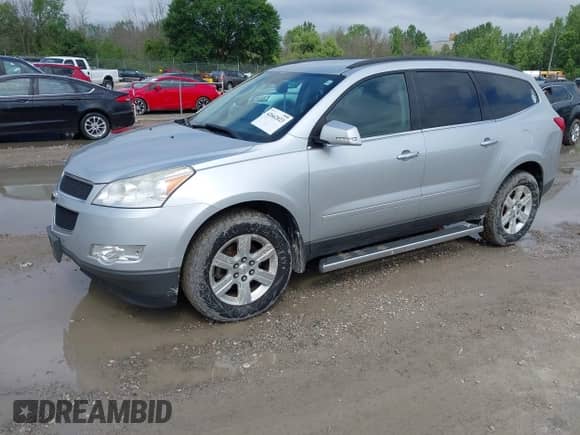 2011 Chevrolet Traverse 1LT with VIN 1GNKVGED4BJ387073, listed as a IAAI auction lot 42662023 with 204,407 mi miles and . Bid and sale history available at DreamBid. Image 2.