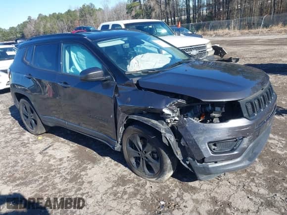 2020 Jeep Compass Latitude with VIN 3C4NJCBB8LT141103, listed as a IAAI auction lot 41263757 with 128,272 mi miles and . Bid and sale history available at DreamBid. Image 1.