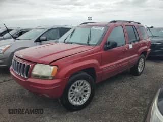 2002 Jeep Grand Cherokee Limited с VIN 1J4GX58S12C166326, выставлен на аукционе Copart как лот 76040724 с пробегом Не указан миль и Списание • Salvage title. История ставок и продаж доступна на DreamBid. Изображение 1.