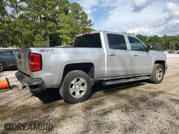 2015 Chevrolet Silverado 1500 LT with VIN 3GCUKREC4FG477151, listed as a Copart auction lot 82183335 with 182,819 mi miles and Salvage title. Bid and sale history available at DreamBid. Image 3.