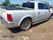 2016 Ram 1500 Laramie with VIN 1C6RR6NT5GS403500, listed as a IAAI auction lot 42207272 with 134,456 mi miles and . Bid and sale history available at DreamBid. Image 4.