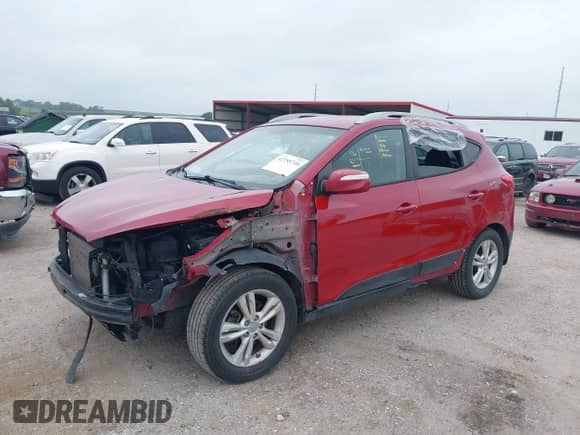 2013 Hyundai Tucson Limited с VIN KM8JUCAC4DU622369, выставлен на аукционе IAAI как лот 42755740 с пробегом 94 877 миль миль и . История ставок и продаж доступна на DreamBid. Изображение 2.