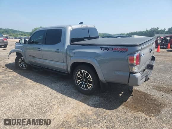 2020 Toyota Tacoma SR5 z VIN 3TMCZ5AN3LM365185, wystawiony jako Copart lot #65887715 z przebiegiem 123 533 mil mil oraz Szkoda całkowita • Salvage title. Historia ofert i sprzedaży dostępna na DreamBid. Obrazek 2.