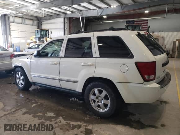 2009 Jeep Grand Cherokee Rocky Mountain с VIN 1J8GR48K59C535072, выставлен на аукционе Copart как лот 48006945 с пробегом 197 619 миль миль и Списание • Salvage title. История ставок и продаж доступна на DreamBid. Изображение 2.