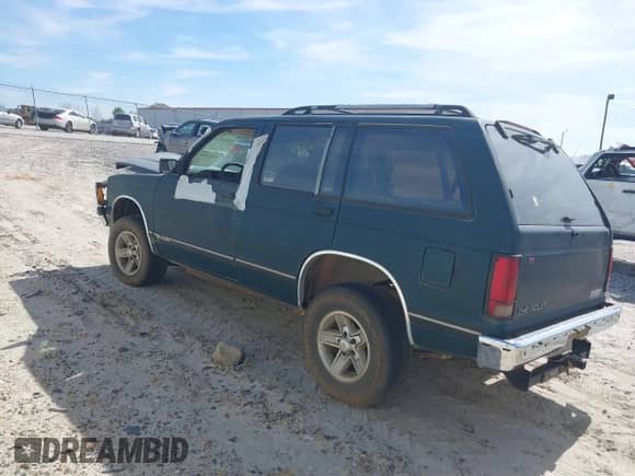 1994 Chevrolet Blazer z VIN 1GNCS13W3R0180933, wystawiony jako IAAI lot #41823501 z przebiegiem 259 563 mil mil oraz . Historia ofert i sprzedaży dostępna na DreamBid. Obrazek 3.