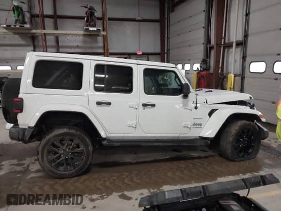 2021 Jeep Wrangler Unlimited Sahara с VIN 1C4JJXP60MW830307, выставлен на аукционе IAAI как лот 41869863 с пробегом 37 201 миль миль и . История ставок и продаж доступна на DreamBid. Изображение 13.