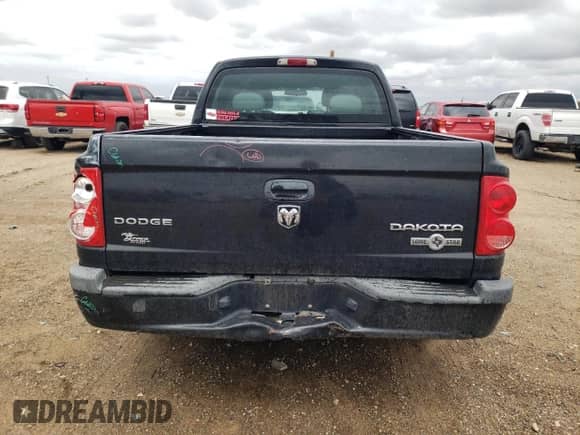 2010 Dodge Dakota Bighorn/Lonestar z VIN 1D7CE3GKXAS100755, wystawiony jako Copart lot #51169125 z przebiegiem 114 606 mil mil oraz Szkoda całkowita • Salvage title. Historia ofert i sprzedaży dostępna na DreamBid. Obrazek 6.