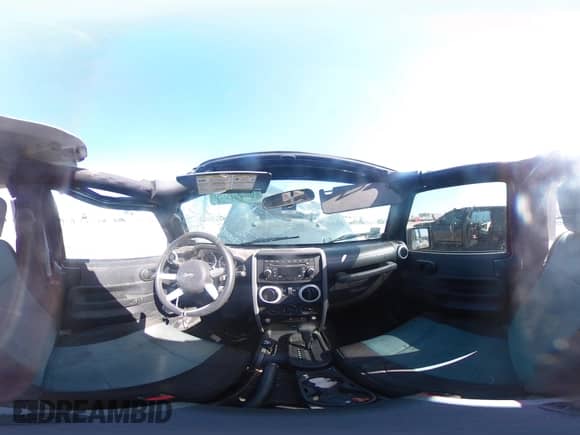 2008 Jeep Wrangler Sahara с VIN 1J4FA54128L605732, выставлен на аукционе Copart как лот 66987395 с пробегом 46 373 миль миль и Списание • Salvage title. История ставок и продаж доступна на DreamBid. Изображение 16.