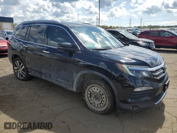 2018 Honda Pilot Touring with VIN 5FNYF5H91JB021704, listed as a Copart auction lot 70420785 with 127,929 mi miles and Clean title. Bid and sale history available at DreamBid. Image 4.