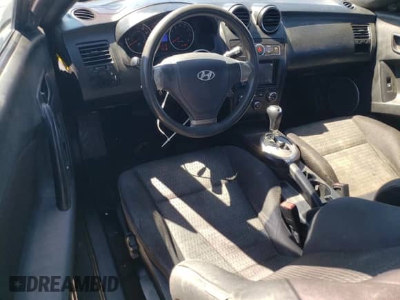 2008 Hyundai Tiburon GS с VIN KMHHM66D38U265788, выставлен на аукционе Copart как лот 48551184 с пробегом 166 754 миль миль и Списание • Salvage title. История ставок и продаж доступна на DreamBid. Изображение 8.
