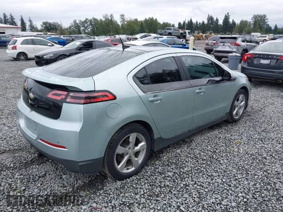 2012 Chevrolet Volt with VIN 1G1RB6E40CU128051, listed as a IAAI auction lot 42920607 with 74,535 mi miles and . Bid and sale history available at DreamBid. Image 4.