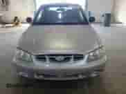 2002 Hyundai Accent GS z VIN KMHCG35C32U190168, wystawiony jako Copart lot #71414935 z przebiegiem 205 445 mil mil oraz Szkoda całkowita • Salvage title. Historia ofert i sprzedaży dostępna na DreamBid. Obrazek 5.