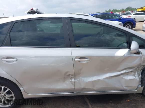 2015 Toyota Prius Two z VIN JTDZN3EU2FJ038659, wystawiony jako IAAI lot #42093821 z przebiegiem 143 691 mil mil oraz . Historia ofert i sprzedaży dostępna na DreamBid. Obrazek 13.