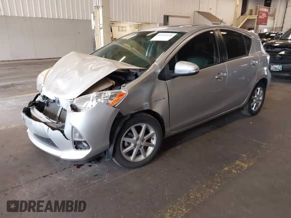 2013 Toyota Prius One z VIN JTDKDTB31D1055630, wystawiony jako IAAI lot #43197126 z przebiegiem 113 286 mil mil oraz . Historia ofert i sprzedaży dostępna na DreamBid. Obrazek 2.