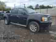 2011 GMC Sierra 1500 Denali with VIN 3GTP2XE27BG167353, listed as a Copart auction lot 82311715 with 156,089 mi miles and Salvage title. Bid and sale history available at DreamBid. Image 4.