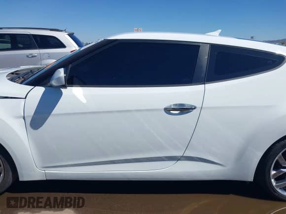 2014 Hyundai Veloster z VIN KMHTC6AD4EU213537, wystawiony jako IAAI lot #43358808 z przebiegiem 54 973 mil mil oraz . Historia ofert i sprzedaży dostępna na DreamBid. Obrazek 14.