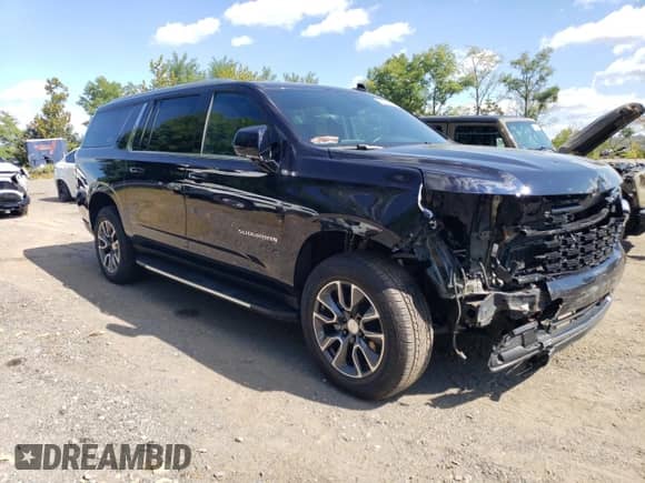 2024 Chevrolet Suburban LS z VIN 1GNSKBET0RR106398, wystawiony jako Copart lot #81633855 z przebiegiem 7 234 mil mil oraz Szkoda całkowita • Salvage title. Historia ofert i sprzedaży dostępna na DreamBid. Obrazek 4.