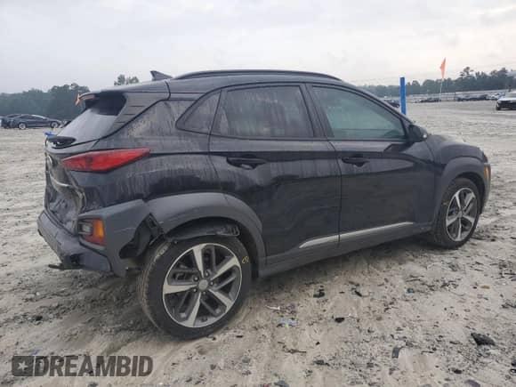 2021 Hyundai Kona Ultimate z VIN KM8K53A57MU644031, wystawiony jako Copart lot #69363535 z przebiegiem 60 943 mil mil oraz Szkoda całkowita • Salvage title. Historia ofert i sprzedaży dostępna na DreamBid. Obrazek 3.