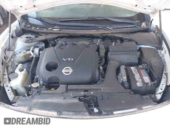 2013 Nissan Maxima SV z VIN 1N4AA5AP2DC818284, wystawiony jako IAAI lot #43348708 z przebiegiem 157 605 mil mil oraz . Historia ofert i sprzedaży dostępna na DreamBid. Obrazek 10.