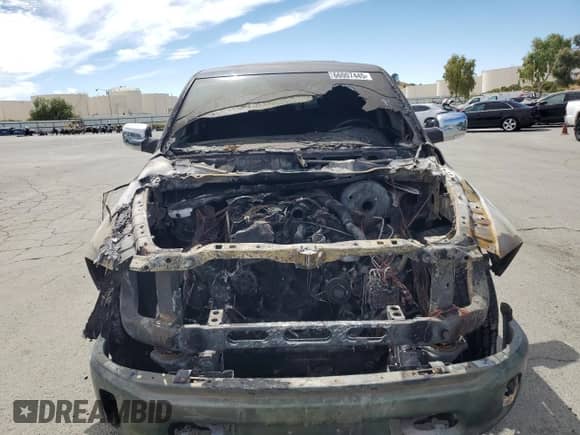 2014 Ram 1500 Laramie z VIN 1C6RR7NM9ES398863, wystawiony jako Copart lot #66007445 z przebiegiem Nie podano mil oraz Nie do naprawy • Non repairable. Historia ofert i sprzedaży dostępna na DreamBid. Obrazek 5.