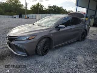 2022 Toyota Camry XSE с VIN 4T1K61AK8NU034521, выставлен на аукционе Copart как лот 70755245 с пробегом 124 343 миль миль и Списание • Salvage title. История ставок и продаж доступна на DreamBid. Изображение 1.