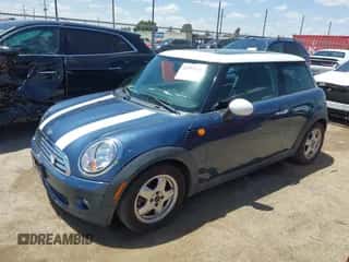 2009 MINI Hardtop with VIN WMWMF33509TW78295, listed as a IAAI auction lot 42293731 with 105,109 mi miles and . Bid and sale history available at DreamBid. Image 2.