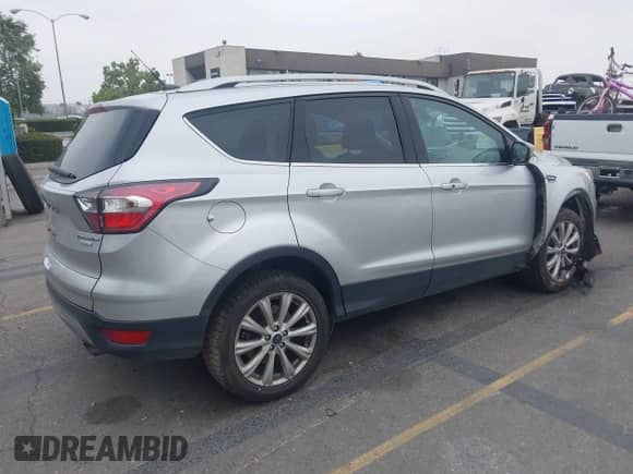 2017 Ford Escape Titanium с VIN 1FMCU0JD5HUB29838, выставлен на аукционе IAAI как лот 42354028 с пробегом 58 250 миль миль и . История ставок и продаж доступна на DreamBid. Изображение 4.