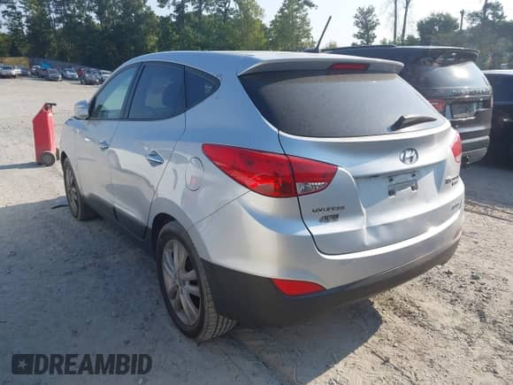 2013 Hyundai Tucson GLS with VIN KM8JUCAC4DU729468, listed as a IAAI auction lot 43157791 with 155,911 mi miles and . Bid and sale history available at DreamBid. Image 3.