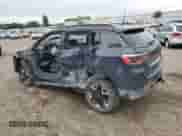 2017 Jeep Compass Trailhawk with VIN 3C4NJDDBXHT688190, listed as a Copart auction lot 63299085 with 104,758 mi miles and Clean title. Bid and sale history available at DreamBid. Image 2.