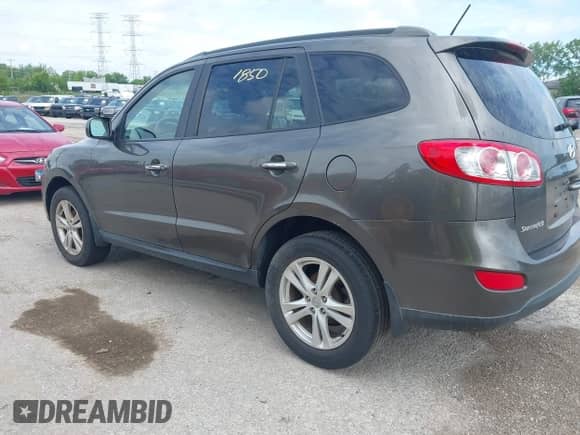 2012 Hyundai Santa Fe Limited with VIN 5XYZK4AG8CG118820, listed as a IAAI auction lot 42361850 with 298,744 mi miles and . Bid and sale history available at DreamBid. Image 3.