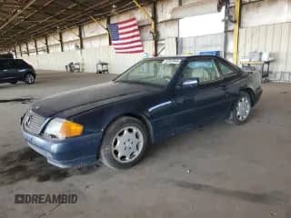 1994 Mercedes-Benz SL 5.0L with VIN WDBFA67E2RF092295, listed as a Copart auction lot 52933945 with 89,085 mi miles and Clean title. Bid and sale history available at DreamBid. Image 1.