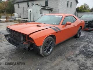 2010 Dodge Challenger R/T with VIN 2B3CJ5DT2AH313920, listed as a Copart auction lot 82409475 with 129,988 mi miles and Salvage title. Bid and sale history available at DreamBid. Image 1.