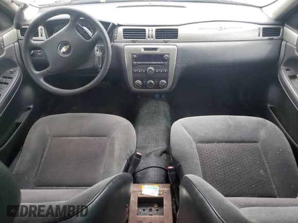 2012 Chevrolet Impala Police Police with VIN 2G1WD5E3XC1162170, listed as a Copart auction lot 70986324 with 148,208 mi miles and Salvage title. Bid and sale history available at DreamBid. Image 8.