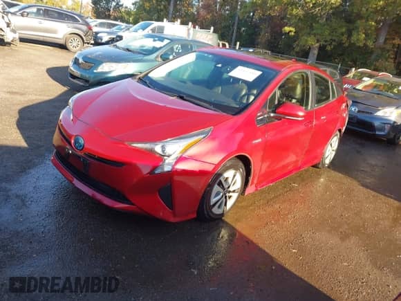 2016 Toyota Prius Three z VIN JTDKARFUXG3517545, wystawiony jako IAAI lot #43457481 z przebiegiem 77 044 mil mil oraz . Historia ofert i sprzedaży dostępna na DreamBid. Obrazek 17.