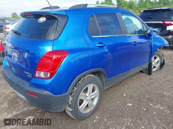 2015 Chevrolet Trax LT with VIN KL7CJRSB8FB239836, listed as a IAAI auction lot 43016210 with 90,645 mi miles and . Bid and sale history available at DreamBid. Image 4.