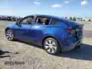 2021 Tesla Model Y Long Range with VIN 5YJYGAEE8MF174415, listed as a Copart auction lot 89557375 with 55,722 mi miles and Salvage title. Bid and sale history available at DreamBid. Image 2.