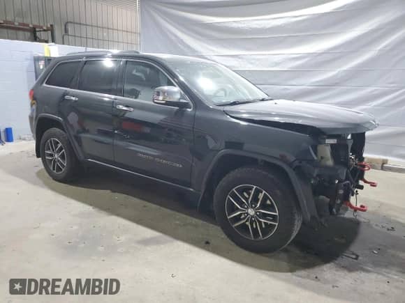 2017 Jeep Grand Cherokee Limited with VIN 1C4RJFBT3HC751215, listed as a Copart auction lot 61076405 with 93,651 mi miles and Salvage title. Bid and sale history available at DreamBid. Image 4.