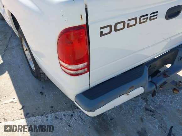 2001 Dodge Dakota z VIN 1B7FL26X71S161985, wystawiony jako IAAI lot #41697721 z przebiegiem 218 168 mil mil oraz . Historia ofert i sprzedaży dostępna na DreamBid. Obrazek 15.