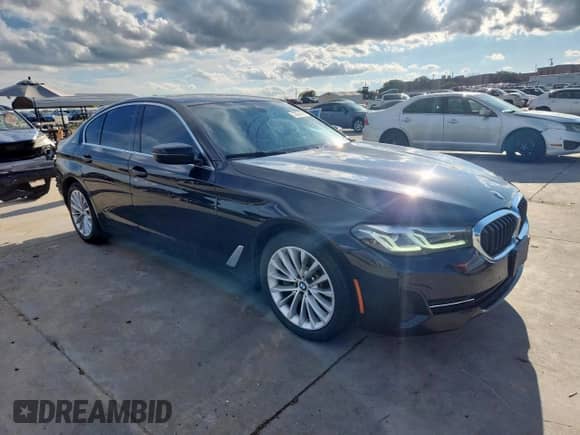 2022 BMW 5 Series 530i with VIN WBA53BH02NWX75043, listed as a Copart auction lot 82035635 with 48,284 mi miles and Clean title. Bid and sale history available at DreamBid. Image 4.