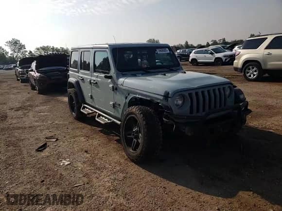 2023 Jeep Wrangler Willys with VIN 1C4HJXDG9PW615072, listed as a Copart auction lot 59606805 with 72,969 mi miles and Salvage title. Bid and sale history available at DreamBid. Image 13.