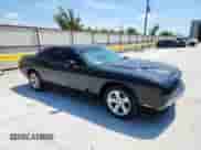 2013 Dodge Challenger SXT с VIN 2C3CDYAG5DH704373, выставлен на аукционе Copart как лот 70580635 с пробегом 113 104 миль миль и Списание • Salvage title. История ставок и продаж доступна на DreamBid. Изображение 4.