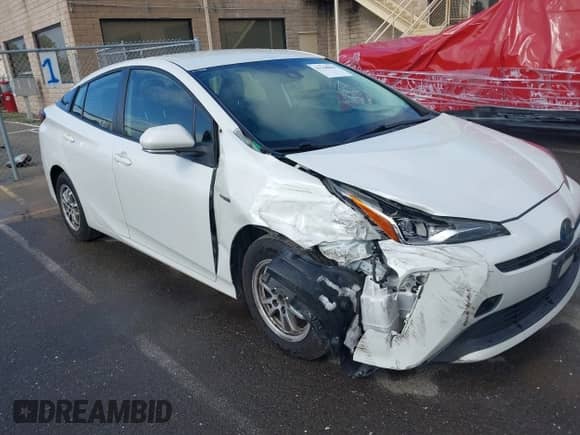 2019 Toyota Prius L Eco with VIN JTDKARFU7K3093038, listed as a IAAI auction lot 41768066 with 124,495 mi miles and . Bid and sale history available at DreamBid. Image 1.
